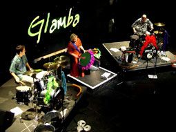 Glamba on stage at The Artrix Theatre, Bromsgrove